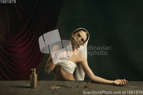 Image of Modern remake of classical artwork with coronavirus theme - young medieval woman on dark background