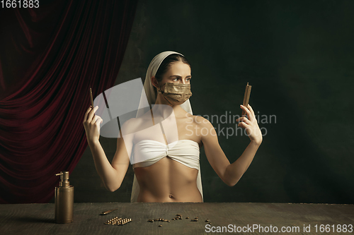 Image of Modern remake of classical artwork with coronavirus theme - young medieval woman on dark background