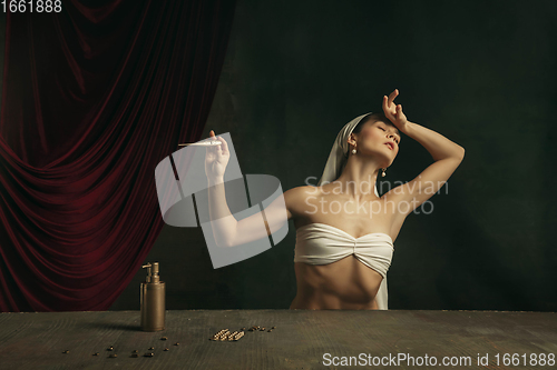 Image of Modern remake of classical artwork with coronavirus theme - young medieval woman on dark background