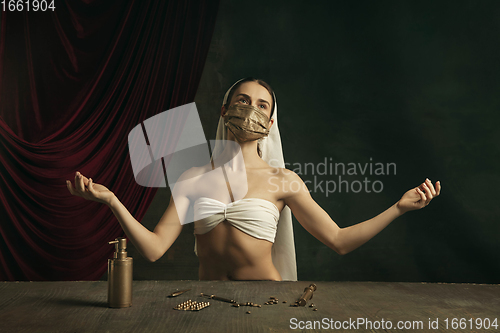 Image of Modern remake of classical artwork with coronavirus theme - young medieval woman on dark background