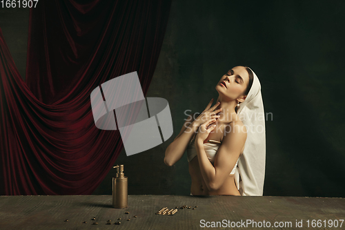 Image of Modern remake of classical artwork with coronavirus theme - young medieval woman on dark background