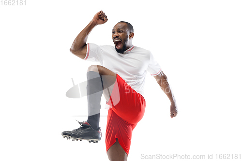 Image of Funny emotions of professional football, soccer player isolated on white studio background, excitement in game