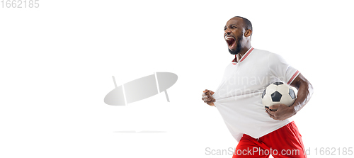 Image of Funny emotions of professional football, soccer player isolated on white studio background, excitement in game