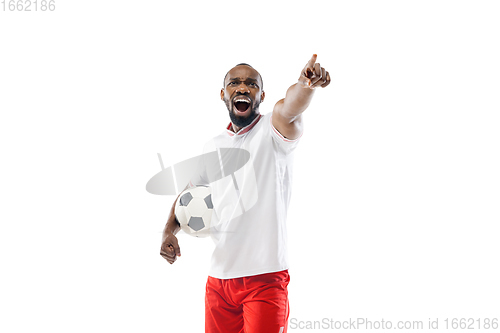 Image of Funny emotions of professional football, soccer player isolated on white studio background, excitement in game