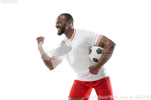 Image of Funny emotions of professional football, soccer player isolated on white studio background, excitement in game