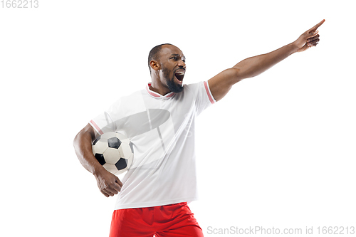 Image of Funny emotions of professional football, soccer player isolated on white studio background, excitement in game