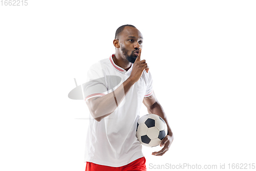 Image of Funny emotions of professional football, soccer player isolated on white studio background, excitement in game