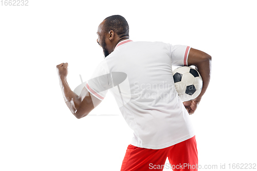 Image of Funny emotions of professional football, soccer player isolated on white studio background, excitement in game