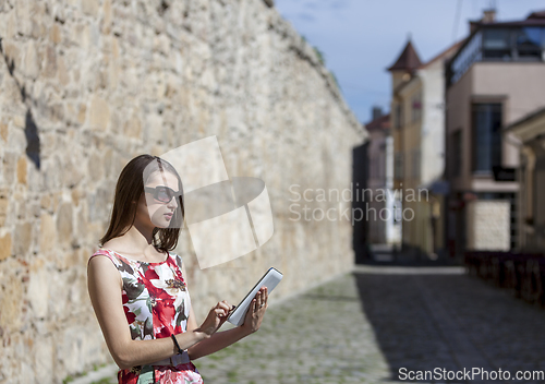 Image of Young Woman Using a Tablet