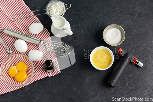 Image of ingredients and tools for food cooking on table