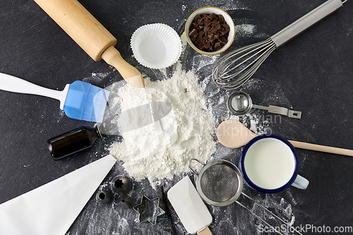 Image of flour with baking and cooking ingredients on table