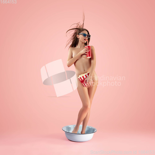 Image of Portrait of a girl like modern remake of the Birth of Venus by Botticelli on pink background with copyspace