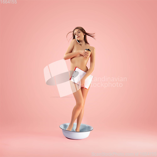 Image of Portrait of a girl like modern remake of the Birth of Venus by Botticelli on pink background with copyspace