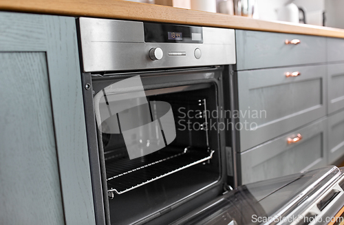 Image of open oven at home kitchen