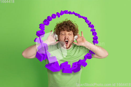 Image of Man shouting, screaming on studio background. Sales, offer, business, cheering fun concept.