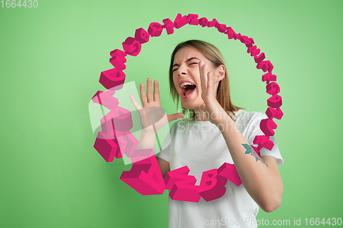 Image of Woman shouting, screaming on studio background. Sales, offer, business, cheering fun concept.
