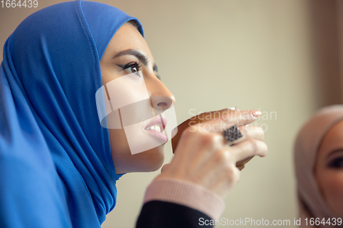 Image of Beautiful arab women meeting at cafe or restaurant, friends or business meeting