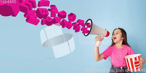 Image of Girl shouting with megaphone, loudspeaker on studio background. Sales, offer, business, cheering fun concept.