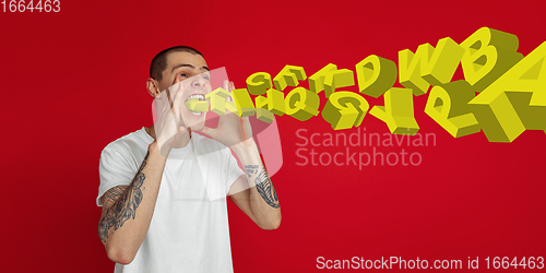 Image of Man shouting, screaming on studio background. Sales, offer, business, cheering fun concept.