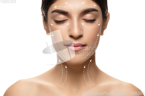 Image of Beautiful female face with lifting up arrows isolated on white background