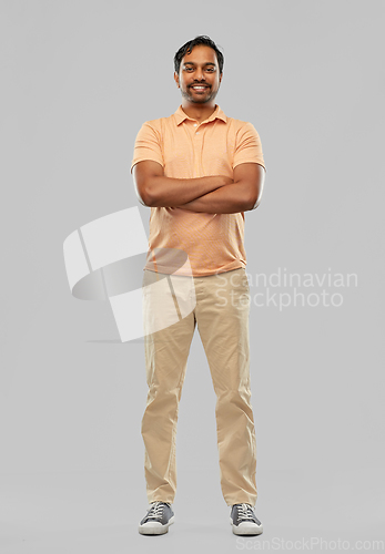 Image of portrait of happy smiling young indian man