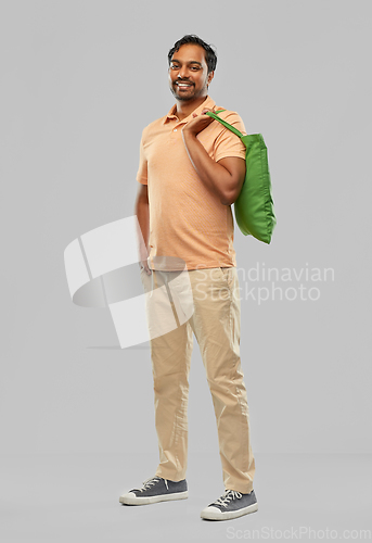 Image of man with reusable canvas bag for food shopping