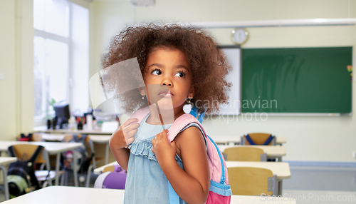 Image of african american girl with backpack at school