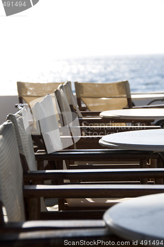 Image of cafe setting by the sea