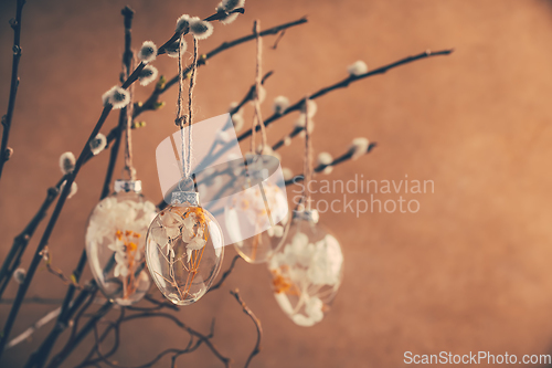 Image of Holidays and Easter concept - close up of pussy willow branches decorated with Easter eggs