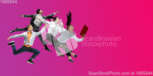 Image of Happy office workers jumping and dancing in casual clothes or suit on gradient neon fluid background. Flyer with copyspace