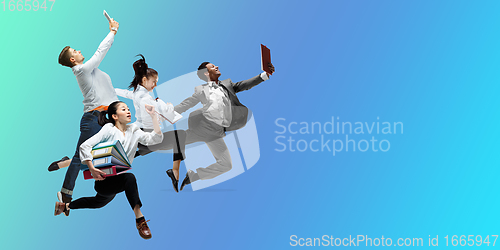 Image of Happy office workers jumping and dancing in casual clothes or suit on gradient neon fluid background. Flyer with copyspace