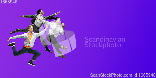 Image of Happy office workers jumping and dancing in casual clothes or suit on gradient neon fluid background. Flyer with copyspace