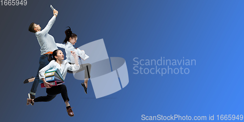 Image of Happy office workers jumping and dancing in casual clothes or suit on gradient neon fluid background. Flyer with copyspace