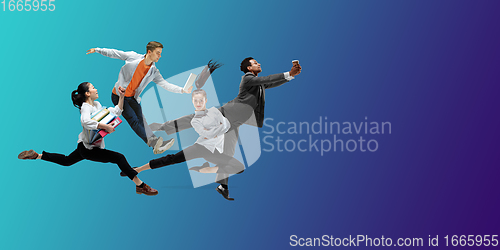 Image of Happy office workers jumping and dancing in casual clothes or suit on gradient neon fluid background. Flyer with copyspace