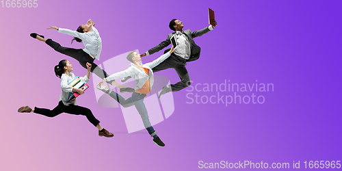 Image of Happy office workers jumping and dancing in casual clothes or suit on gradient neon fluid background. Flyer with copyspace