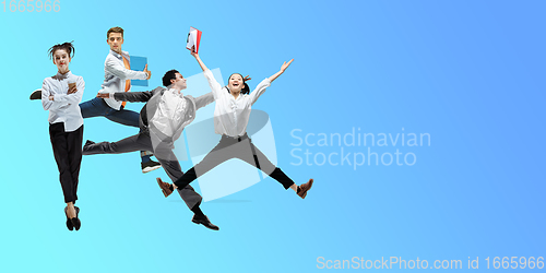 Image of Happy office workers jumping and dancing in casual clothes or suit on gradient neon fluid background. Flyer with copyspace