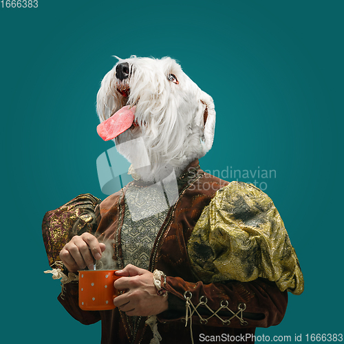 Image of Model like medieval royalty person in vintage clothing headed by dog head. Concept of comparison of eras, artwork, renaissance, baroque style. Creative collage.