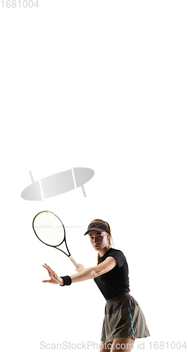 Image of Young caucasian professional sportswoman playing tennis isolated on white background