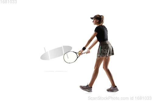 Image of Young caucasian professional sportswoman playing tennis isolated on white background