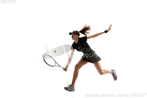 Image of Young caucasian professional sportswoman playing tennis isolated on white background