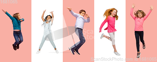 Image of Group of elementary school kids or pupils jumping in colorful casual clothes on bicolored studio background. Creative collage.