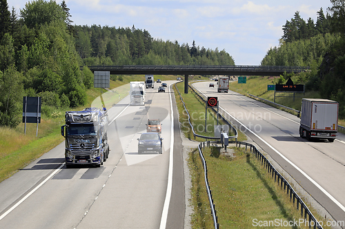 Image of Truck Traffic on Summer Freeway 