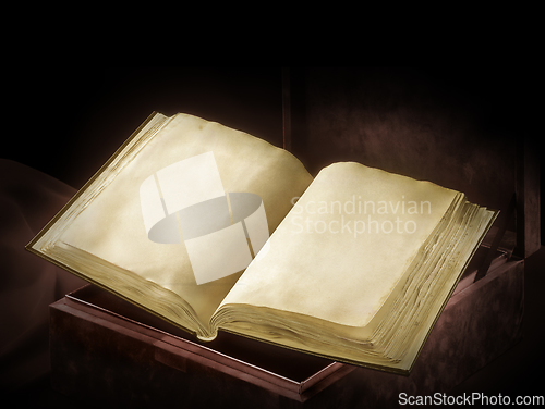 Image of Old book in dark ambiance