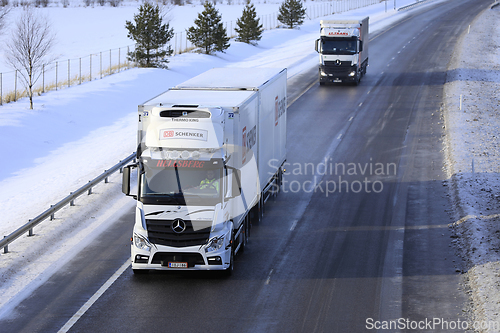 Image of Two Mercedes-Benz Actros Trucks on Motorway