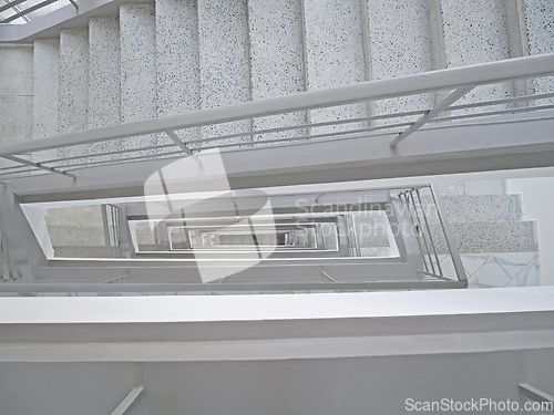 Image of Long stairwell in shades of gray,  staircase niche top view