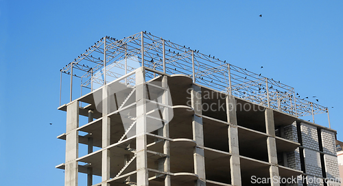 Image of New building construction with concrete and metal details