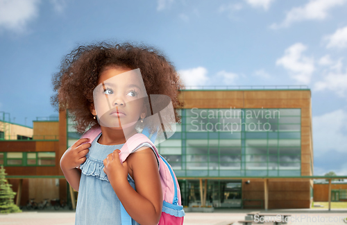 Image of sad little african american girl with backpack