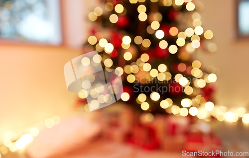 Image of blurred decorated christmas tree at home