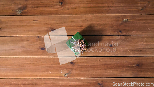 Image of christmas gift on wooden boards