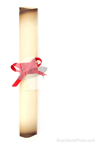 Image of Old Parchment Scroll Tied with Red Ribbon